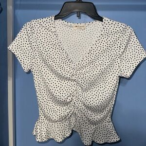Polka dot peplum style blouse